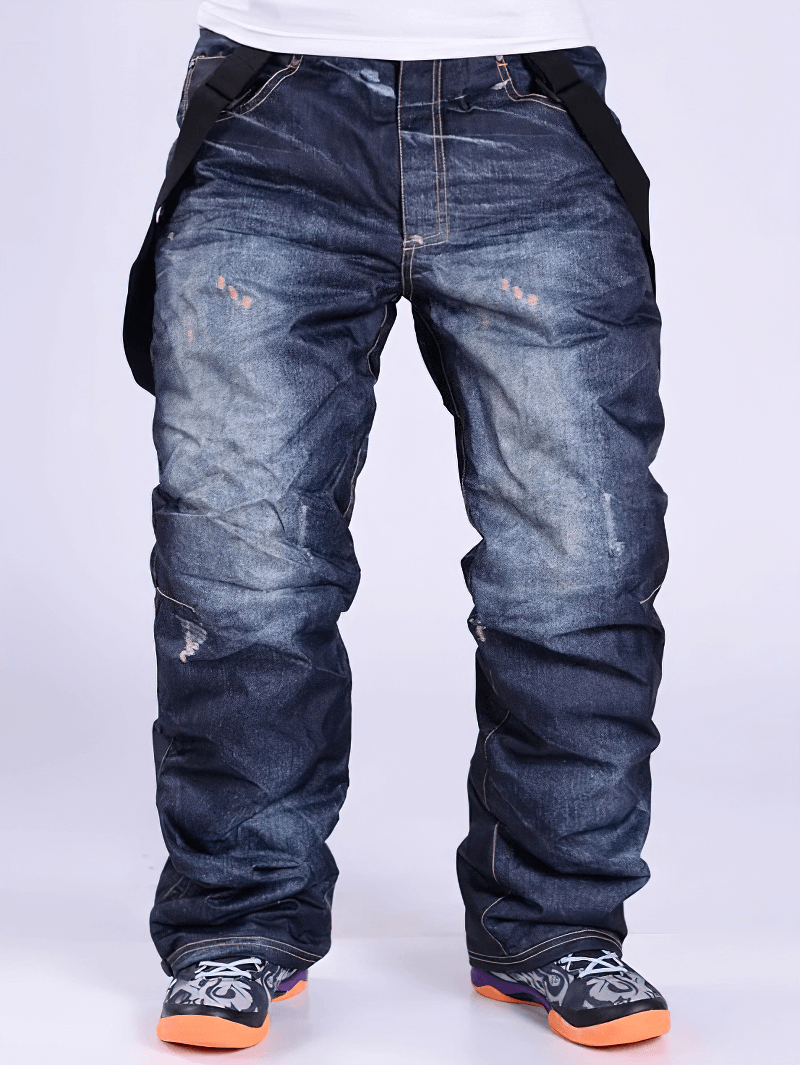 Windproof thermal snowboard denim pants with suspenders, perfect for skiing in cold weather, secure fit with zipper fly closure.